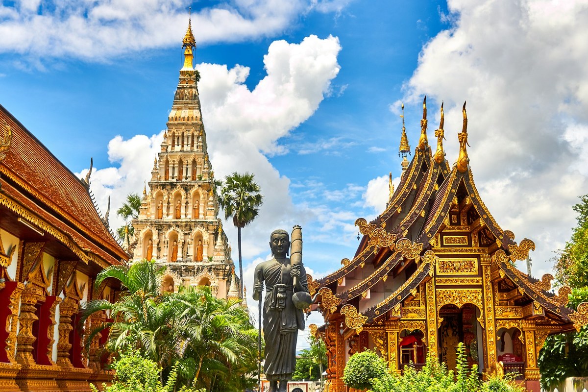 standing statue and temples landmark during daytime
